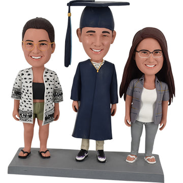 Three person Bobblehead dolls